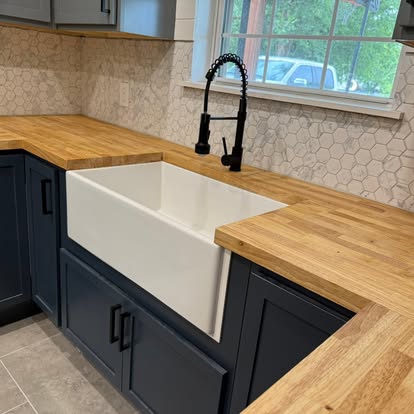 Farmhouse sink · hex backsplash
